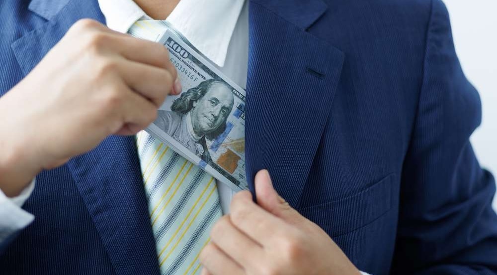 business man taking money